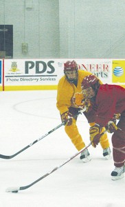 FSU Hockey Team: Working to Perfect Their Skills <span class='credit'>Photo By: Kate Dupon | Photographer</span><span class='description'>The Ferris State hockey team works to perfect their skills at the Robert L. Ewigleben Ice Arena. A majority of the defense team that earned fifth place in the CCHA in goals allowed last year have returned for another season.</span>