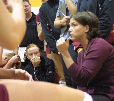 Coach Brandel-Wilhelm: Volleyball head coach Tia Brandel-Wilhhelm motivating and encouraging her team during a huddle. The volleyball team ended the 2009 season with a record of 19-12. Torch File Photo