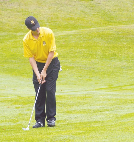 Swinging Ahead: Former Ferris golfer, Eric Lilleboe, analyzes a shot on the green during his warm-up. Lilleboe qualified for the U.S. Amateur Championship at Chambers Bay in University Place, Wash. and also co-medaled at the U.S. Amateur Qualifer in Harbor Springs. Torch File Photo Swinging Ahead: Former Ferris golfer, Eric Lilleboe, analyzes a shot on the green during his warm-up. Lilleboe qualified for the U.S. Amateur Championship at Chambers Bay in University Place, Wash. and also co-medaled at the U.S. Amateur Qualifer in Harbor Springs. Torch File Photo